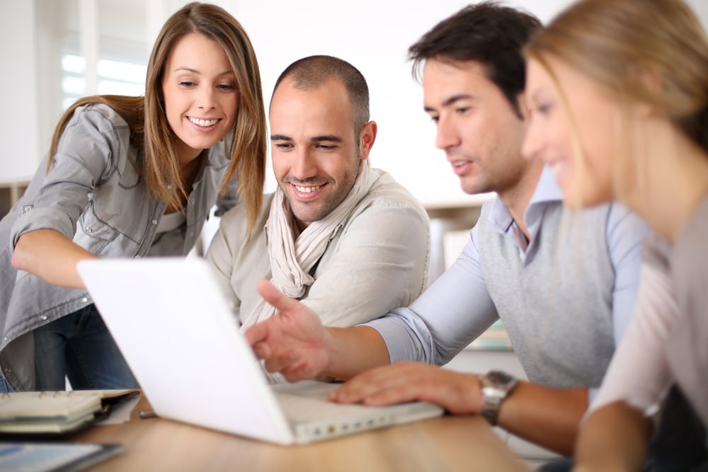 sales team checking results from ABM campaign